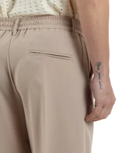 Pantaloni uomo viscosa baggy fondo ampio elastico sul retro abbottonatura allungata beige GIOSAL-P6258A
