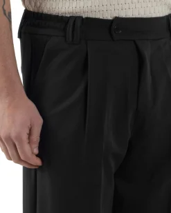 Pantaloni uomo viscosa baggy fondo ampio elastico sul retro abbottonatura allungata nero GIOSAL-P6257A