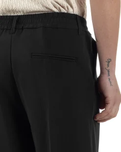 Pantaloni uomo viscosa baggy fondo ampio elastico sul retro abbottonatura allungata nero GIOSAL-P6257A